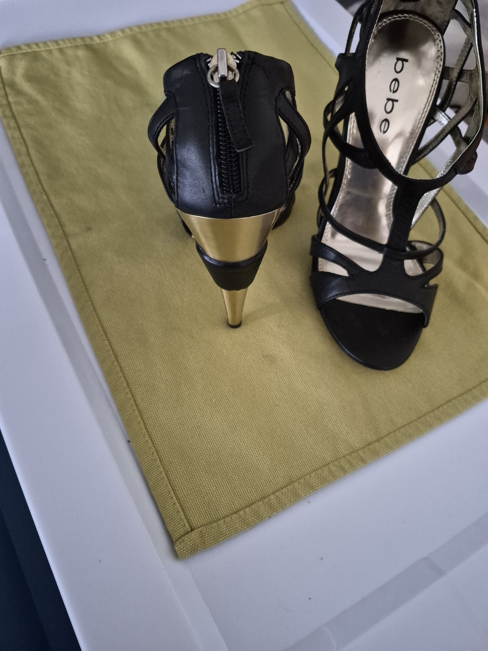 bebe Black Strappy High Heel Sandals with Gold Stiletto